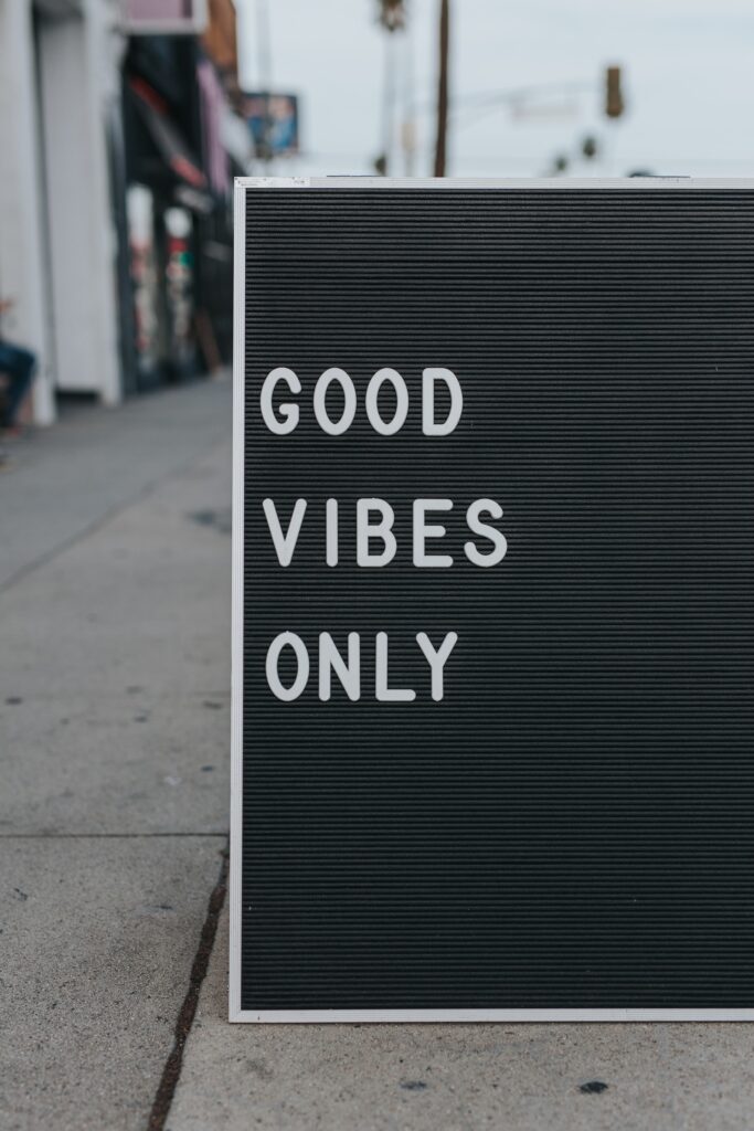 sidewalk sign with the message GOOD VIBES ONLY in capital letters