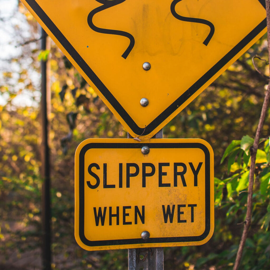 slippery when wet sign to illustrate the use of lube